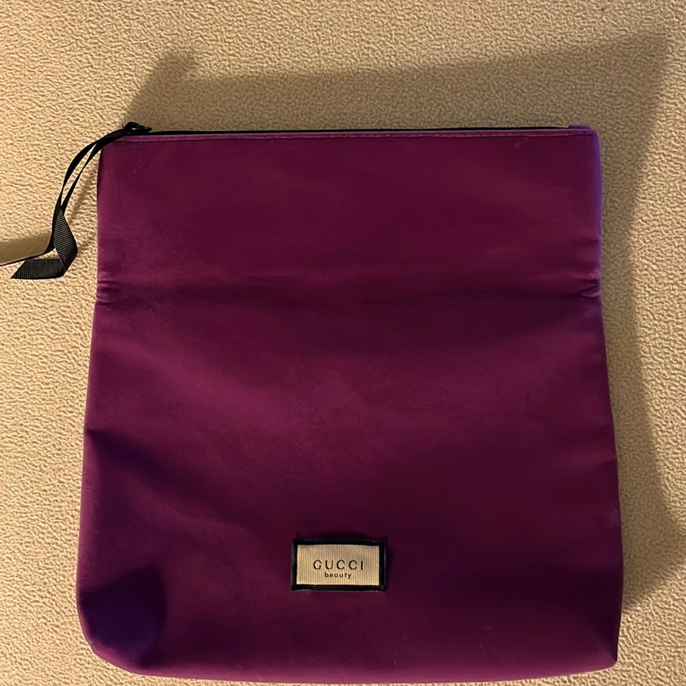 Gucci plum color cosmetic/toiletry case zip top New